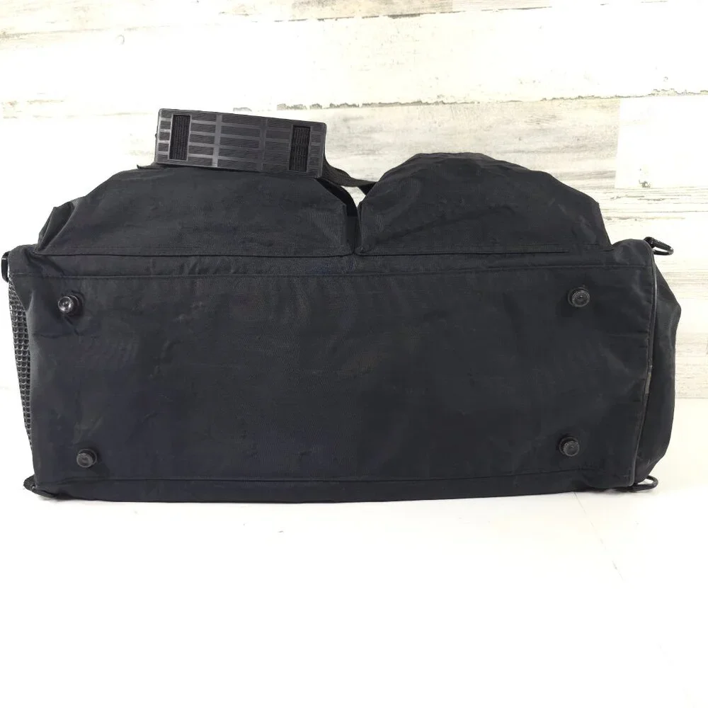 VINTAGE HARLEY DAVIDSON AN AMERICAN LEGEND BLACK DUFFLE BAG WITH SHOULDER STRAP.